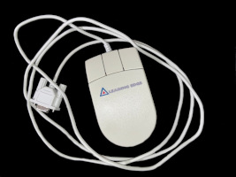 an unplugged leading edge branded serial mouse